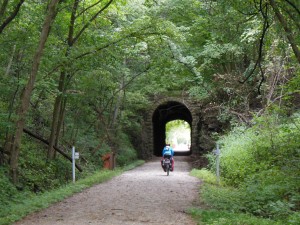 Deb entering tunnel on Katy Trail